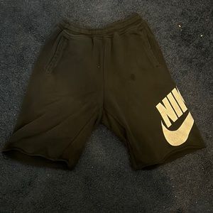 Large black Nike shorts (with strings+ elastic waist band)